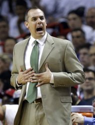 Indiana Pacers head coach Frank Vogel yells at his team during the first half of Game 1 in their NBA basketball Eastern Conference finals playoff series against the Miami Heat, Wednesday, May 22, 2013 in Miami. (AP Photo/Lynne Sladky)