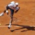Djokovic of Serbia serves to Berdych of Czech Republic during their men's singles quarter final match at the Rome Masters tennis tournament