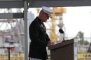 File - USMC Lt. Gen. Richard Mills speaks during christening ceremonies for the USS Somerset at the Huntington Ingalls Industries shipyard Shipyard in Avondale, La., in this Saturday, July 28, 2012 file photo. The U.S. military has been launching cyberattacks against its opponents in Afghanistan, a senior officer said last week, making an unusually explicit acknowledgment of the oft-hidden world of electronic warfare. Marine Lt. Gen. Richard P. Mills' comments came at a conference in Baltimore during which he explained how U.S. commanders considered cyberweapons an important part of their arsenal. (AP Photo / Gerald Herbert, file)