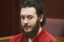 File-This June 4,2013 file photo shows Aurora theater shooting suspect James Holmes in court in Centennial, Colo. Holmes is scheduled Tuesday, June 25, 2013 at a hearing where the judge overseeing the Colorado theater shooting case will reconsider the timing of the trial and other proceedings. (AP Photo/The Denver Post, Andy Cross, Pool,File)