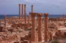 Old Roman ruins stand in the ancient archaeological site of Sabratha on Libya's Mediterranean coast
