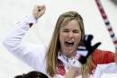 Canada's skip Jennifer Jones celebrates after delivering the last rock during the women's curling semifinal game victory over Britain at the 2014 Winter Olympics, Wednesday, Feb. 19, 2014, in Sochi, Russia. (AP Photo/Robert F. Bukaty)