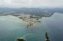 This Thursday, Dec. 26, 2013 photo, shows Henoko of Nago city on southern Japanese islands of Okinawa. Okinawan Gov. Hirokazu Nakaima signed off Friday, Dec. 27, 2013, on the long-awaited relocation of a U.S. military base, a major step toward allowing the U.S. to move forward with plans to consolidate its troops in Okinawa and move some to Guam. Nakaima approved the Japanese government's application to reclaim land for a new base in Henoko, which would replace the U.S. Marine Corps base in Futenma, a more congested part of Okinawa's main island, Japanese media reported. (AP Photo/Kyodo News) JAPAN OUT, CREDIT MANDATORY