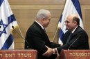 Israel's Prime Minister Netanyahu shakes hands with head of Kadima party Mofaz in Jerusalem