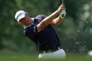 Van Pelt of the U.S. hits on the ninth fairway during the AT&T National golf tournament in Bethesda