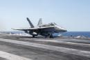 This June 6, 2016 US Navy photo shows an F/A-18C Hornet as it launches from the flight deck of aircraft carrier USS Harry S. Truman in the Mediterranean Sea