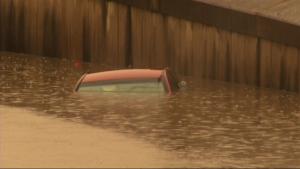 Raw: Woman Rescued After Driving Into Flood