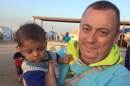 An undated family handout photo of British aid worker Alan Henning taken at a refugee camp on the Turkish-Syria border
