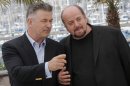 Alec Baldwin speaks with director James Toback during a photo call for the film Seduced and Abandoned (AP/Lionel Cironneau)