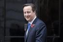 Britain's Prime Minister David Cameron waits to greet Jordan's King Abdullah at Number 10 Downing Street in London