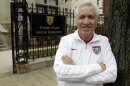 Tom Sermanni, new coach of the United States women's soccer team, poses for a photo outside the United States Soccer Federation Headquarters after an interview with The Associated Press, Tuesday, Oct. 30, 2012, in Chicago. Sermanni was hired Tuesday to replace Pia Sundhage, who led the Americans to back-to-back Olympic gold medals and their first World Cup final in 12 years. Sermanni has spent the last eight years as Australia's coach, taking the Matildas to the quarterfinals of the last two Women's World Cups. (AP Photo/M. Spencer Green)