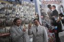 Welker and Everhart raise their glasses in a toast after exchanging vows during their wedding ceremony at a comic book retail shop in Manhattan, New York