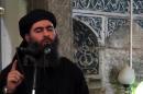 Image grab taken from a propaganda video released on July 5, 2014 by al-Furqan Media allegedly shows the leader of the Islamic State jihadist group, Abu Bakr al-Baghdadi, adressing Muslim worshippers at a mosque in the Iraqi city of Mosul