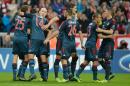 Bayern Munich's players celebrate after their fifth goal during the UEFA Champions League Group D match between Bayern and Czech football club Viktoria Plzen, in Munich, southern Germany, on October 23, 2013