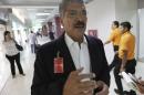 Quijano, presidential candidate of ARENA speaks to Reuters journalists at the international airport in San Salvador