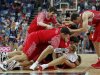 Russia's Shved players celebrate victory against Argentina after their men's bronze medal basketball match at the North Greenwich Arena in London during the London 2012 Olympic Games