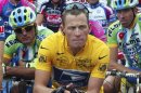 File photo of then US Postal team rider Armstrong of the U.S. waiting for the start of the 89th Tour de France cycling race in Luxembourg