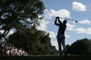 Henrik Stenson, of Sweden, watches his tee shot on the eighth hole during the third round of the PGA Championship golf tournament at Oak Hill Country Club, Saturday, Aug. 10, 2013, in Pittsford, N.Y. (AP Photo/Charlie Riedel)