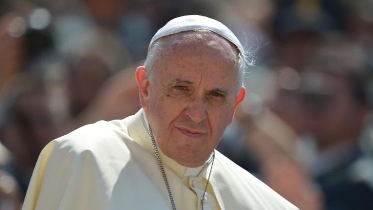 Pope Francis looks on during his general audience at St Peter's Square in the Vatican, on June 11, 2014