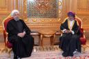 Oman's Sultan Qaboos bin Said (right) and Iranian President Hassan Rouhani meet following the latter arrival in Muscat on February 15, 2017