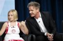 Gordon Ramsay sits next to contestant Sarah at a panel for the television show "Master Chef Junior" during the Fox portion of the Television Critics Association Summer press tour in Beverly Hills