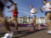 Athletes walk past Buckingham Palace as they compete in the men's 50-kilometer race walk, at the 2012 Summer Olympics, Saturday, Aug. 11, 2012, in London. (AP Photo/Lefteris Pitarakis)