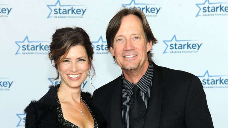 Kevin Sorbo and wife Sam Jenkins are seen walking the red carpet at the Starkey Hearing Foundation's 2013 "So the World May Hear" Awards Gala, on Sunday, July 28, 2013 in St. Paul, Minn. (Photo by Diane Bondareff/Invision for Starkey Hearing Foundation/AP Images)