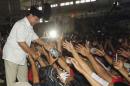 Indonesian presidential candidate Prabowo Subianto greets supporters during a campaign rally in Medan, North Sumatra