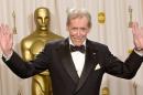 FILE - In this March 23, 2003 file photo, Peter O'Toole appears backstage without his Oscar after receiving the Academy Award's Honorary Award during the 75th annual Academy Awards in Los Angeles. O'Toole, the charismatic actor who achieved instant stardom as Lawrence of Arabia and was nominated eight times for an Academy Award, has died. He was 81. O'Toole's agent Steve Kenis says the actor died Saturday, Dec. 14, 2013 at a hospital following a long illness. (AP Photo/Reed Saxon)