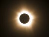 In this photo provided by Tourism Queensland, the moment of a total solar eclipse is observed at Cape Tribulation in Queensland state, Australia, Wednesday, Nov. 14, 2012. Starting just after dawn, the eclipse cast its 150-kilometer (95-mile) shadow in Australia's Northern Territory, crossed the northeast tip of the country and was swooping east across the South Pacific, where no islands are in its direct path. (AP Photo/Tourism Queensland) EDITORIAL USE ONLY