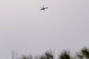 A helicopter of the Syrian regime forces hovers in Syria's northern Latakia province on February 5, 2013