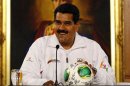 Venezuela's President Nicolas Maduro smiles during a news conference with Venezuela's Under -17 soccer team in Caracas