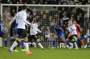 Derby's Scottish defender Craig Bryson (4th L) shoots to score Derby's first goal during their English League Cup quarter-final football match against Chelsea in Derby, central England, on December 16, 2014
