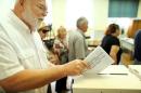 A man casts his ballot at a polling station during a parliamentary election in Zagreb