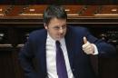 Italy's PM Renzi gives a thumbs-up during a confidence vote at the lower house of the parliament in Rome
