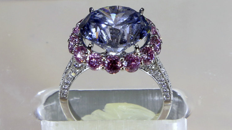 A 7.59-carat internally flawless blue diamond is on display Sotheby's, a New York auction house, Wednesday, Sept. 4, 2013 in New York. Sotheby's also had on display a 118-carat white diamond that will be auctioned in Hong Kong on Oct. 7 and has a pre-sale estimate of $28 million to $35 million. (AP Photo/Mary Altaffe)