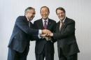 UN Secretary-General Ban Ki-moon pose with Turkish Cypriot leader Akinci and Cypriot President Anastasiades during the Cyprus reunification talks in the Swiss mountain resort of Mont Pelerin