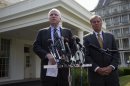 Sen. John McCain, R-Ariz., left, accompanied by Sen. Lindsey Graham, R-S.C., speaks with reporters outside the White House in Washington, Monday, Sept. 2, 2013, following a closed-door meeting with President Barack Obama to discuss the situation with Syria. President Barack Obama, working to persuade skeptical lawmakers to endorse a U.S. military intervention in civil war-wracked Syria, hosted the two leading Capitol Hill foreign policy hawks for talks and directed his national security team to testify before Congress in a determined effort to sell his plan for limited missile strikes against Syrian President Bashar Assad's regime. (AP Photo/Evan Vucci)