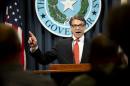 Gov. Rick Perry makes a statement in Austin, Texas on Saturday, Aug. 16, 2014 concerning the indictment on charges of coercion of a public servant and abuse of his official capacity. Perry is the first Texas governor since 1917 to be indicted. (AP Photo/Austin American-Statesman, Laura Skelding)
