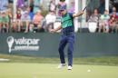 Charl Schwartzel, of South Africa, reacts as he watches his putt about to drop for birdie on the 17th hole during the final round of the Valspar Championship golf tournament Sunday, March 13, 2016, in Palm Harbor, Fla. Schwartzel later defeated Bill Haas in a playoff hole. (AP Photo/Brian Blanco)