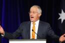 Australian Prime Minister Malcolm Turnbull addresses party supporters during a rally in Sydney, Sunday, July 3, 2016, following a general election. The elections, which pit the conservative coalition government against the center-left Labor Party, cap an extraordinarily volatile period in the nation's politics. (AP Photo/Rick Rycroft)
