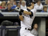 New York Yankees' Ichiro Suzuki looks after his solo home run during the fourth inning of the baseball game against the Boston Red Sox Sunday, Aug. 19, 2012 at Yankee Stadium in New York.  (AP Photo/Seth Wenig)