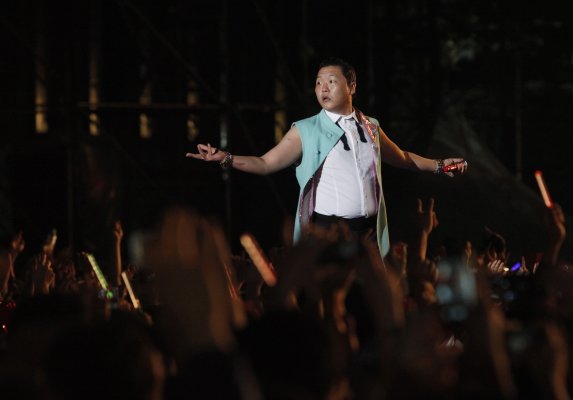 Singer Psy performs at the Seoul Plaza in front of Seoul city hall