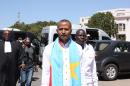 Opposition figure Moise Katumbi (C) arrives at the courthouse in Lubumbashi on May 13, 2016