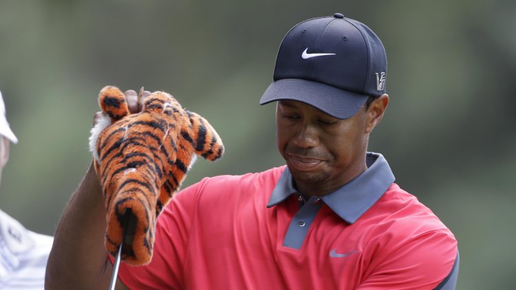 Woods has stiff neck and back from hotel bed