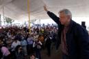 MORENA party leader Obrador waves after giving a speech to supporters in Tlapanoloya