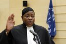 Gambian war crimes lawyer Fatou Bensouda, takes the oath during a swearing-in ceremony as its new prosecutor at The International Criminal Court (ICC) in The Hague, Netherlands, Friday, June 15, 2012. Bensounda replaces Luis Moreno-Ocampo. She will be tasked with trying to bring to justice alleged war criminals including Uganda's Joseph Kony, Libya's Seif al-Islam Gadhafi and Sudanese president Omar al-Bashir. (AP Photo/Bas Czerwinski, Pool)