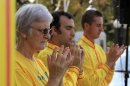 Falun Gong practitioners participate in a protest against China's crackdown on Falun Gong followers in front of the Chinese embassy in Bucharest