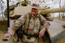 FILE - In this Jan. 12, 1991 file photo, Gen. H. Norman Schwarzkopf stands at ease with his tank troops during Operation Desert Storm in Saudi Arabia. Schwarzkopf died Thursday, Dec. 27, 2012 in Tampa, Fla. He was 78. (AP Photo/Bob Daugherty, File)
