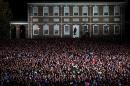 People gather for a rally in support of Democratic nominee Hillary Clinton, former president Bill Clinton and US President Barack Obama on Independence Mall in Philadelphia, Pennsylvania